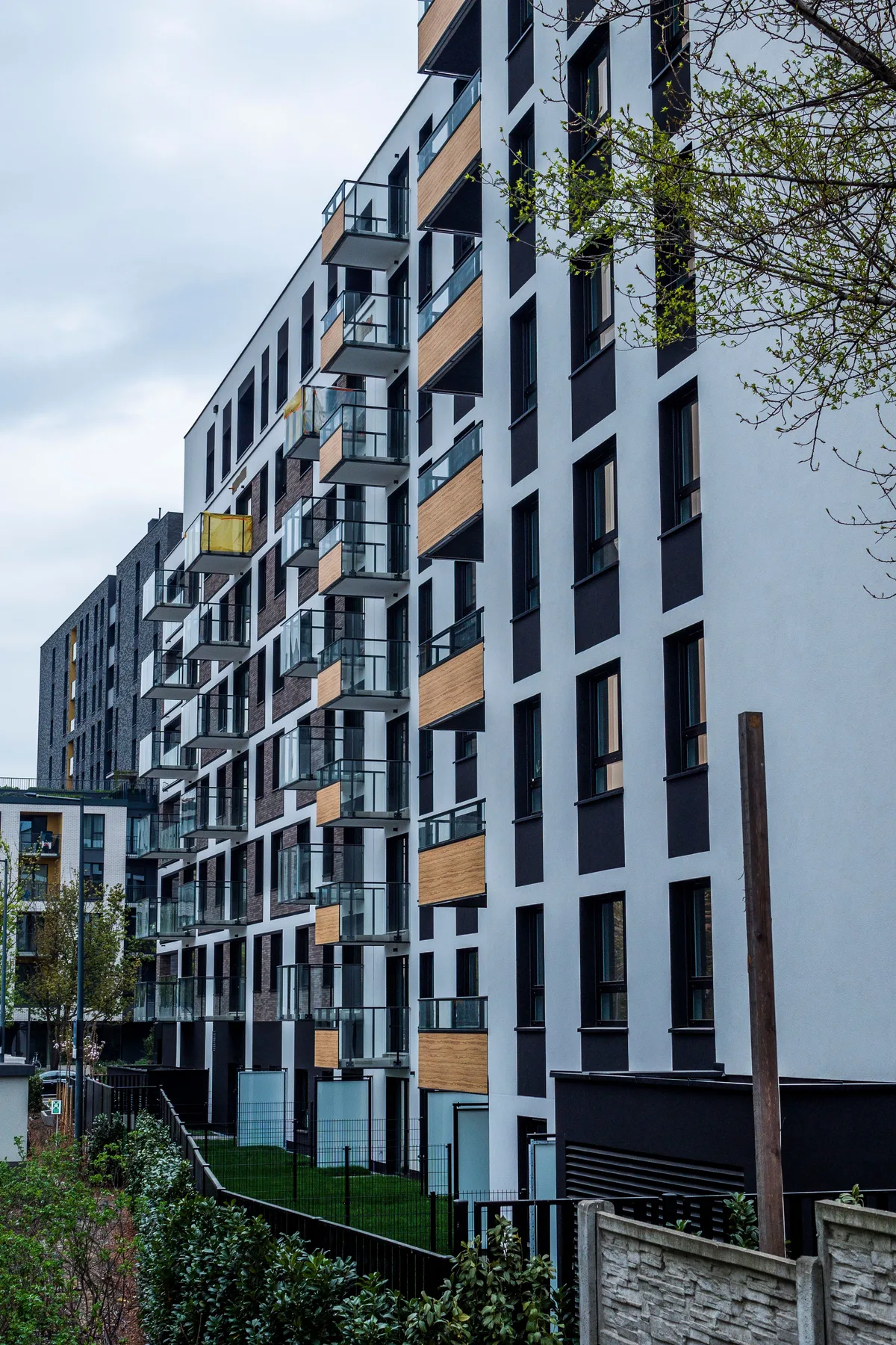 Representative exterior photograph of a modern apartment building