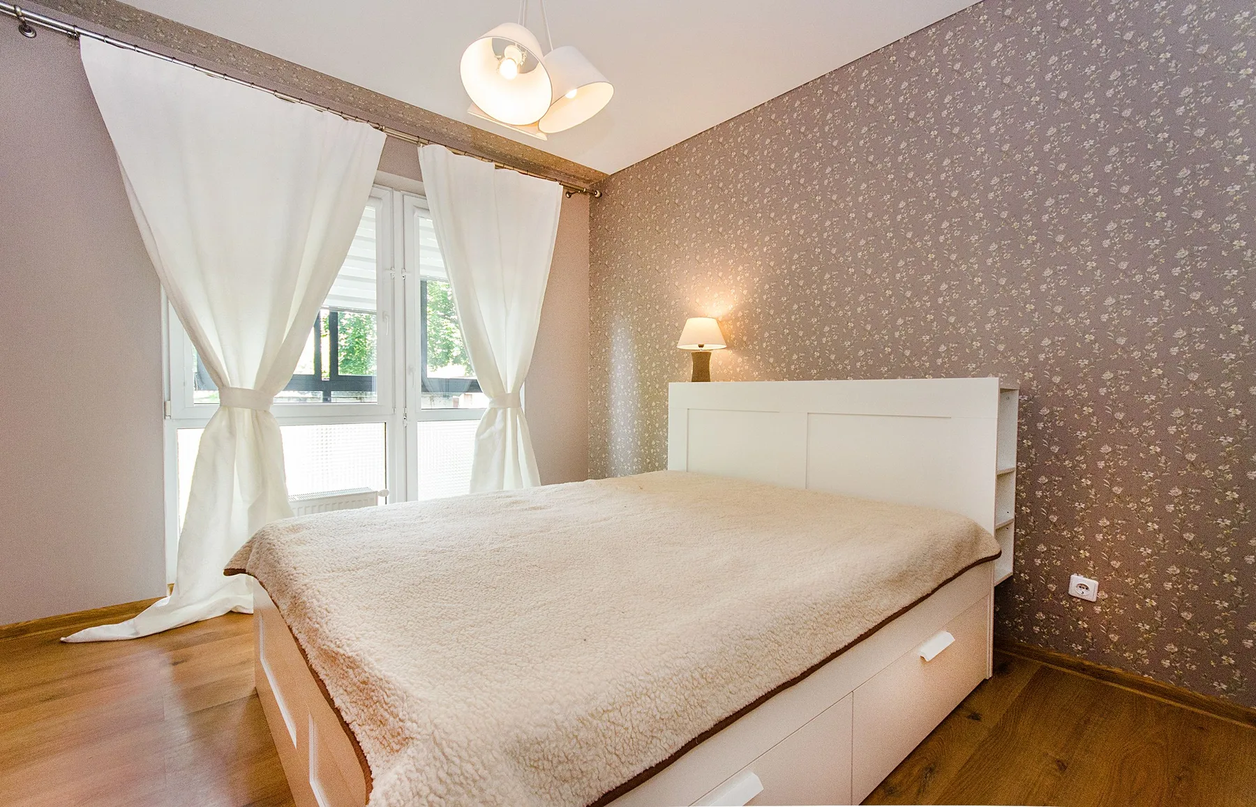 Representative warm contemporary bedroom interior